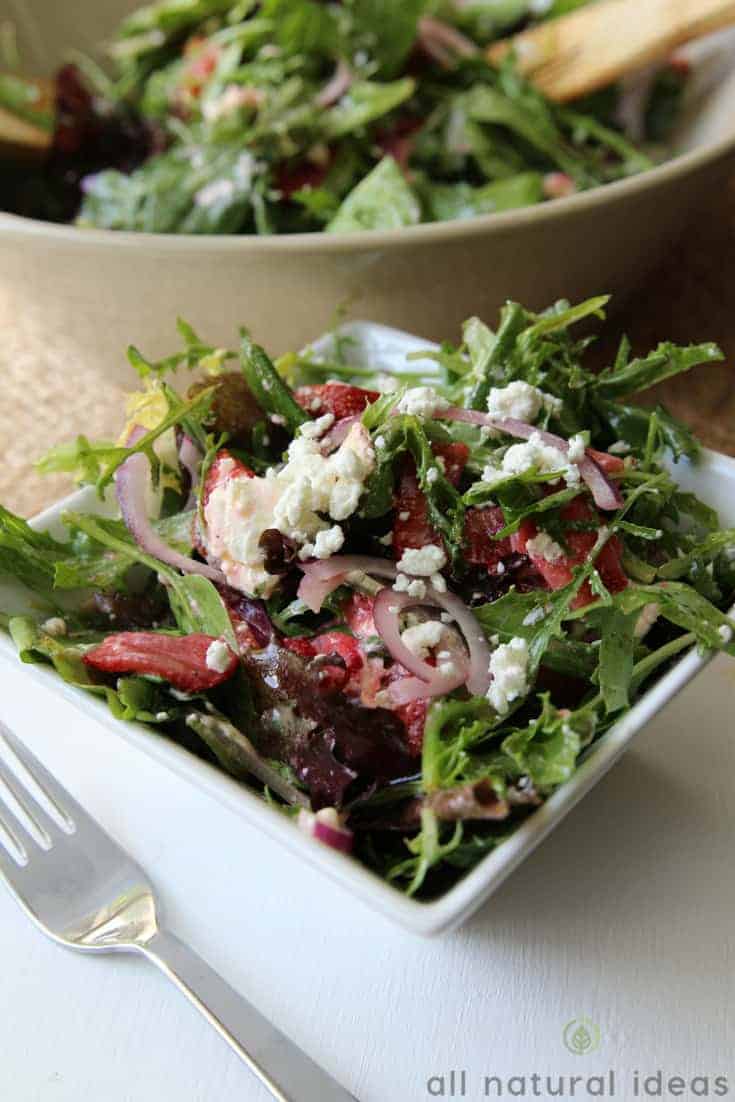 Goat cheese on an easy spinach strawberry walnut salad