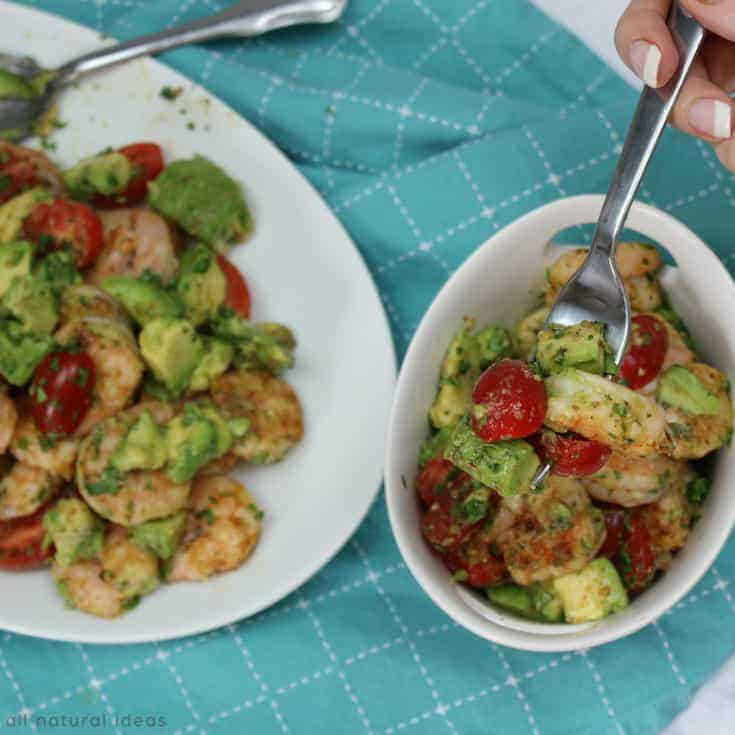 Serving grilled cajun shrimp and avocado salad