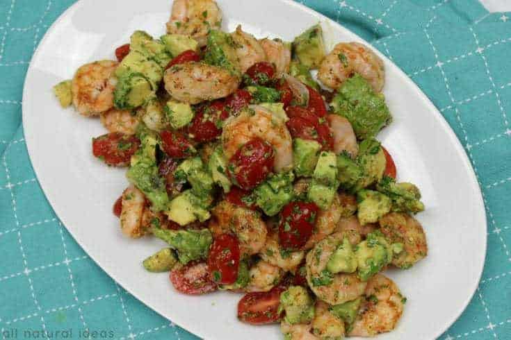 Platter of grilled Cajun shrimp and avocado salad